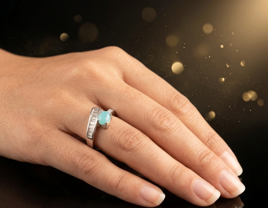 Elegant Aqua Cabochon Ring with Baguette Accent